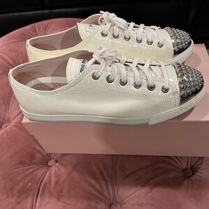MIU MIU studded patent sneakers
